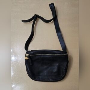 Sleek Black Leather Crossbody Bag with Gold Details